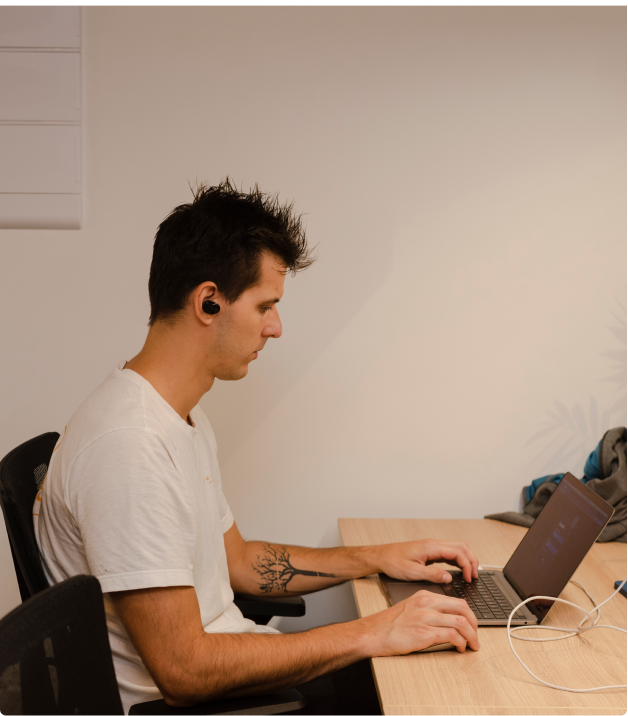 software developer working with his computer