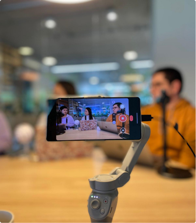 a cell phone recording a meeting