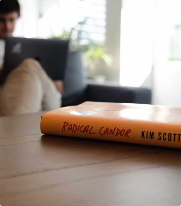 Radical Candor's book on an office table